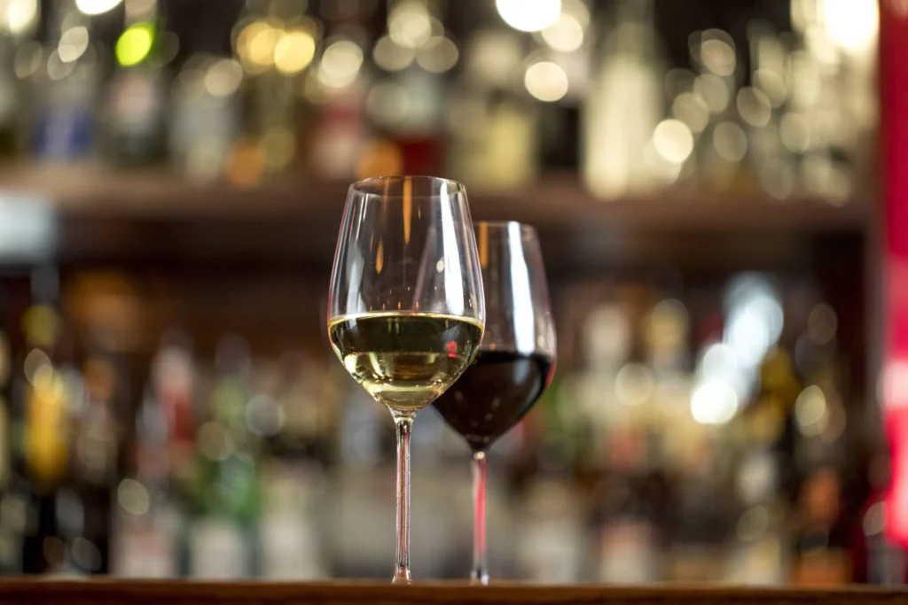 wine glasses on a bar